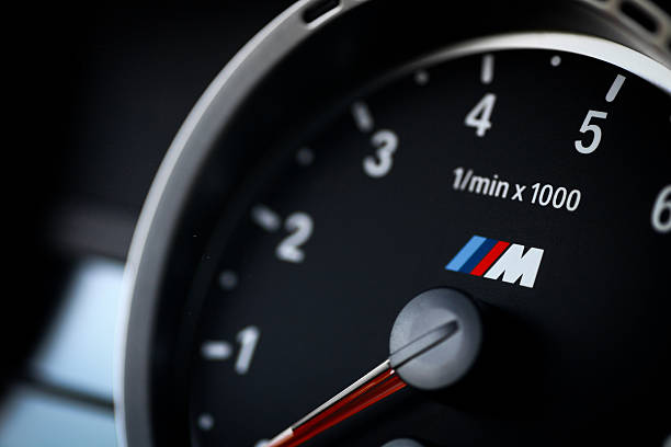 BMW M3 tachometer Bucharest, Romania - July 4, 2013: Detail of the tachometer of a BMW M3 car. The BMW M3 is a high-performance version of the BMW 3-Series, developed by BMW's motorsport division, BMW M. bmw stock pictures, royalty-free photos & images