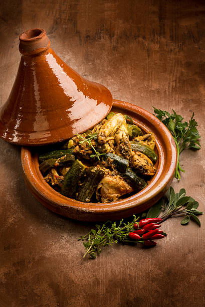 tajine with meat vegetables and spice stock photo