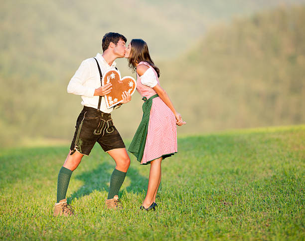 Take my Heart, Couple in Lederhose and Dirndl Tracht  ausseerland stock pictures, royalty-free photos & images