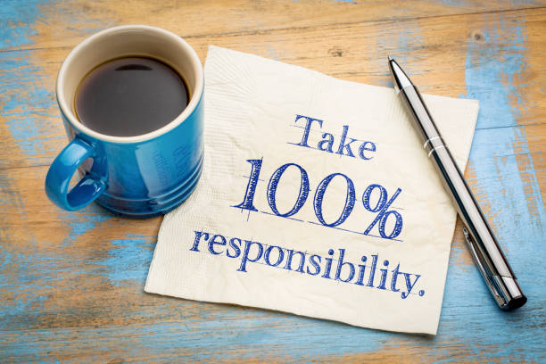 Take responsibility reminder note on napkin Take 100% responsibility reminder note - handwriting on a napkin responsibility stock pictures, royalty-free photos & images