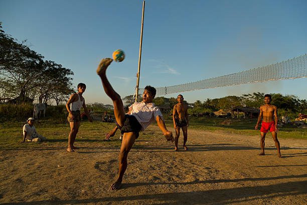 takraw players in myanmar's irrawaddy delta - ayak voleybolu stok fotoğraflar ve resimler