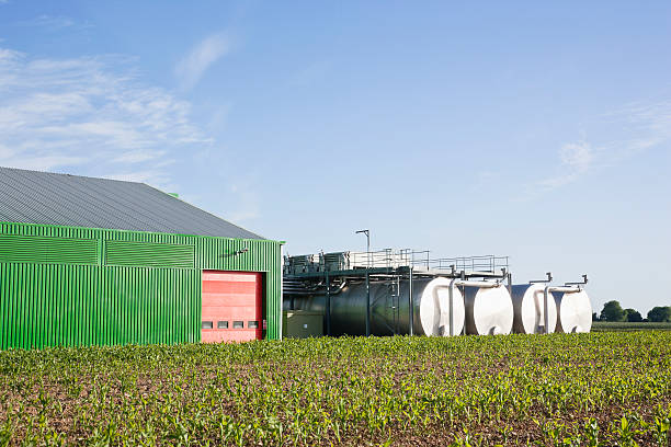 Tanks outside warehouse in rural landscape  agricultural building stock pictures, royalty-free photos & images