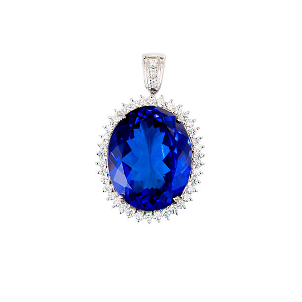 Tanzanite, Blue Gemstone, Pendant, with Diamonds Tanzanite, Blue Gemstone, Pendant, with Diamonds, Isolated on White Background zoisite photos stock pictures, royalty-free photos & images