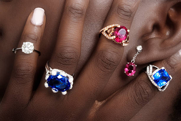 Tanzanite, Rubellite and Diamonds, Designer Jewellery Tanzanite, Rubellite and Diamonds, Designer Jewellery on the Skin of a Black Lady zoisite photos stock pictures, royalty-free photos & images