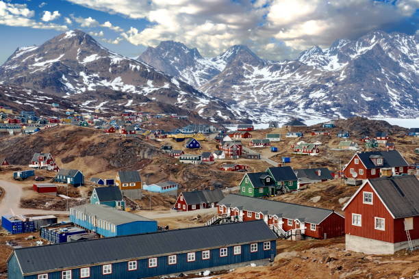 Tasiilaq Panorama A view of Tasiilaq, a town surrounded by high mountains in Eastern Greenland greenland stock pictures, royalty-free photos & images