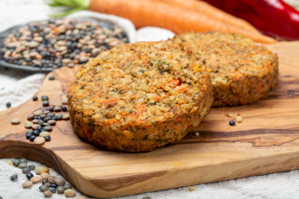 Tasty vegetarian lentils burgers, healthy food stock photo