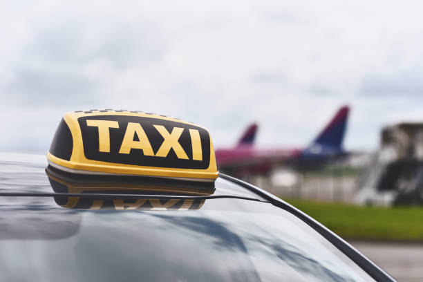 taxi car in airport stock photo