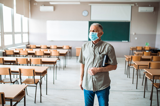 Teacher In An Empty Classroom Stock Photo - Download Image Now - iStock