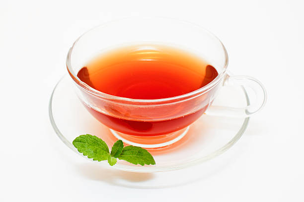 Teacup and Stevia Leaf stock photo