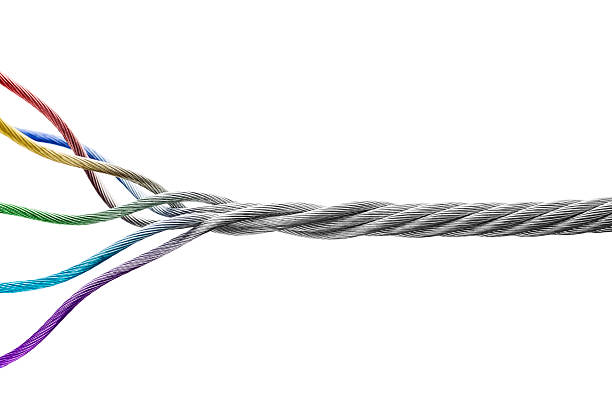 Teamwork - Building a Strong Team Business concept. Strands of different color join together to form a strong steel cable representing different people coming together to form a strong team. steel cable stock pictures, royalty-free photos & images