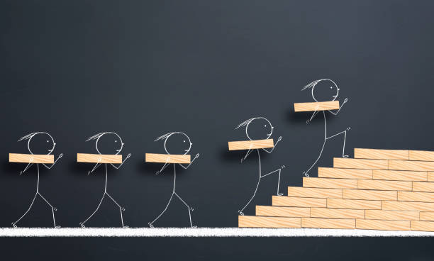 teamwork concept.Team members carry the blocks on their shoulders and make stairs to success  continuity stock pictures, royalty-free photos & images