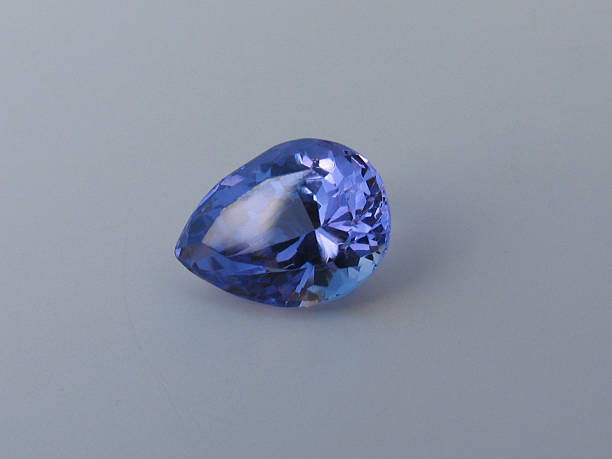 Tear drop tanzanite A tear drop shaped tanzanite zoisite photos stock pictures, royalty-free photos & images