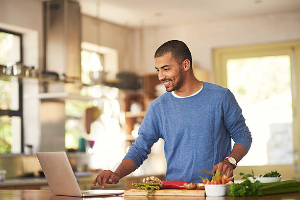 technology has it's place in the kitchen - natural food web imagens e fotografias de stock