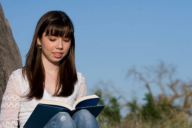 Teen Reading Book stock photo
