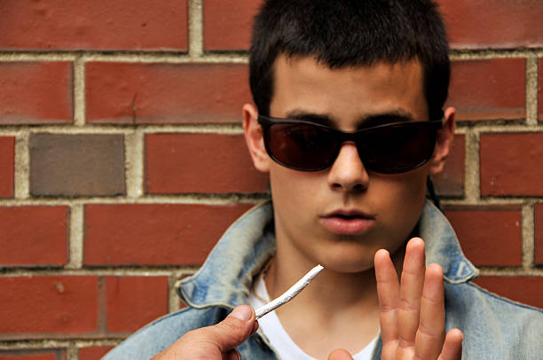 Teen Refuses Joint (Select Focus) stock photo