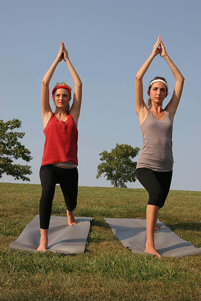 Teen Sisters in Yoga stock photo