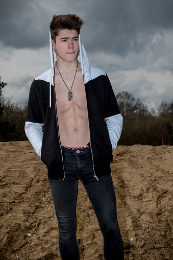 Teenage Boy Showing Off His Abs Stock Photo - Download 