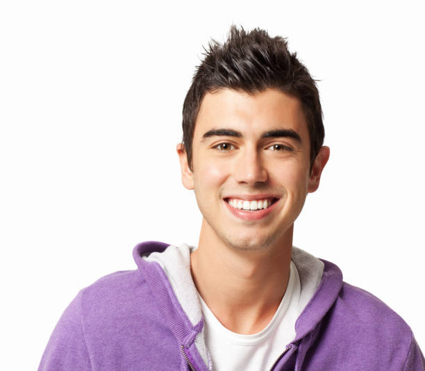 teenage boy with spiky hair - alleen één tienerjongen stockfoto's en -beelden