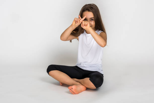 teenager girl demonstrating prohibiting gesture.woman to the intention of the ban
woman to the intention of the ban - flicka, armar kors bildbanksfoton och bilder