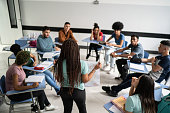 istock Teenager student doing a presentation in the classroom 1356636818
