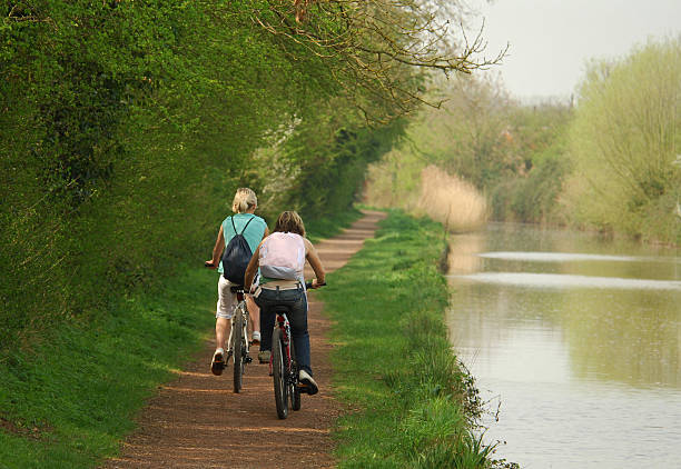 Teenagers Cycling by the Canal, Worcestershire stock photo