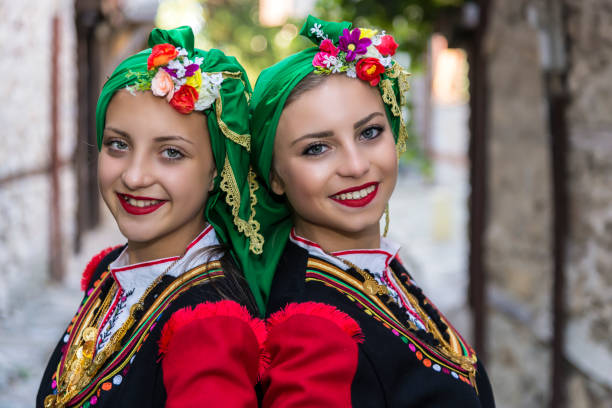 Teenagers dressed in Bulgarian folk costumes stock photo