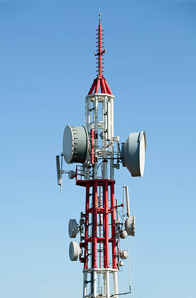 Telecommunication and television broadcast tower stock photo