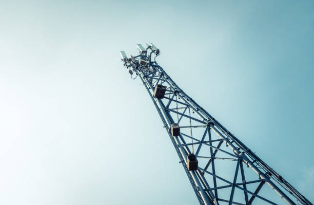 Telecommunications Or Cellphone Radio Tower A Telecommunications, Cellphone Or Mobile Phone Tower With Copy Space communications tower photos stock pictures, royalty-free photos & images