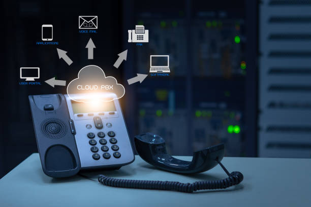 IP Telephony cloud pbx concept, telephone device with illustration icon of voip services IP Telephony cloud pbx concept, telephone device with illustration icon of voip services and networking data center on background voip stock pictures, royalty-free photos & images