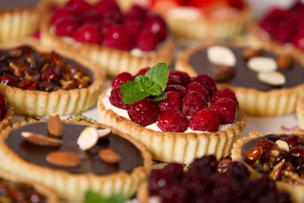 Tempting pastries and pies Variety of french pastries and pies baked pastry item photos stock pictures, royalty-free photos & images