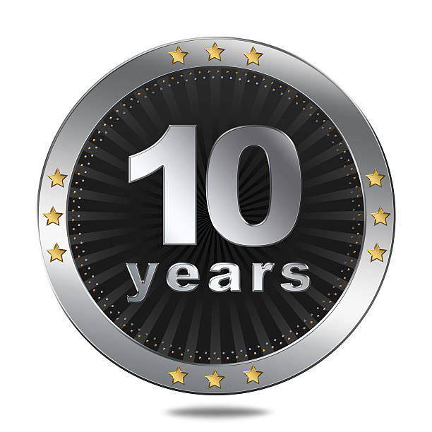 Ten years anniversary button 10 years anniversary silver button with gold stars. 10 11 years stock pictures, royalty-free photos & images