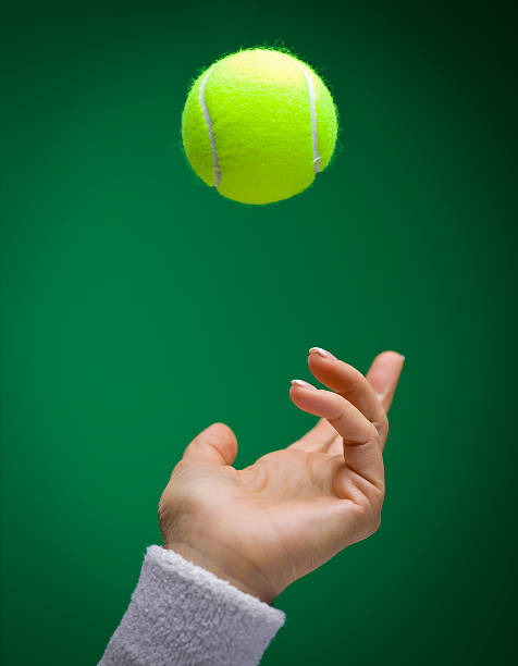 tennis ball toss - wimbledon tennis stok fotoğraflar ve resimler