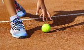istock Tennis ballgirl in action 1353225484
