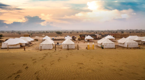 Tents at Thar desert Jaisalmer used by tourist on desert safari at Jaisalmer, Rajasthan at sunset Swiss tents used by tourist for night stay during desert safari at the Thar desert Jaisalmer, Rajasthan rajasthan stock pictures, royalty-free photos & images