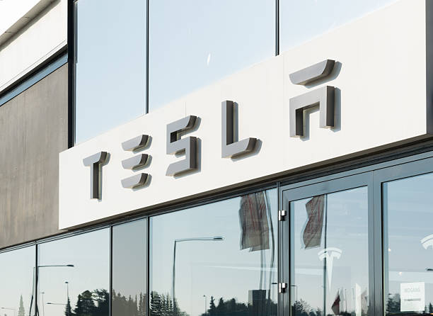 Tesla car dealer entrance stock photo