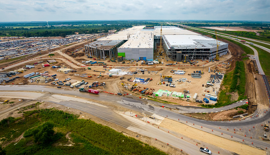 Austin , Texas , USA - August 30th 2021:  Amazing aerial drone views from above GigaTexas show the construction progress of the Factory that will make the Tesla Modlel Y qnd then the Cybertruck and maybe tesla Semi and Tesla Bot