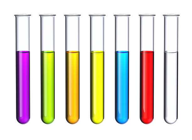 Test tubes. Seven test tubes with a colored liquid isolated on white. vial stock pictures, royalty-free photos & images