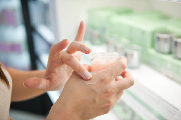 Testing hand cream in store stock photo