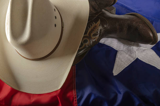 Texas flag wrapping cowboy hat and boots stock photo