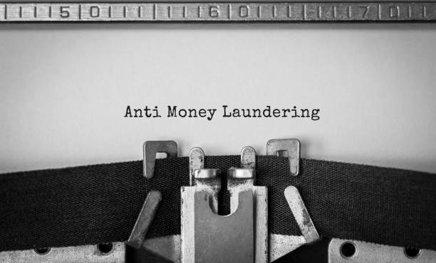 Text Anti Money Laundering typed on retro typewriter stock photo