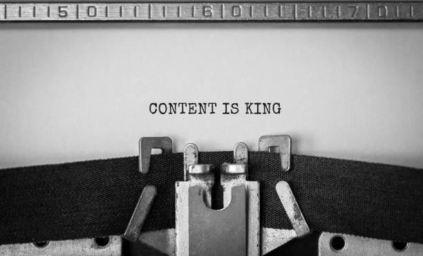 text content is king typed on retro typewriter - marketing imagens e fotografias de stock