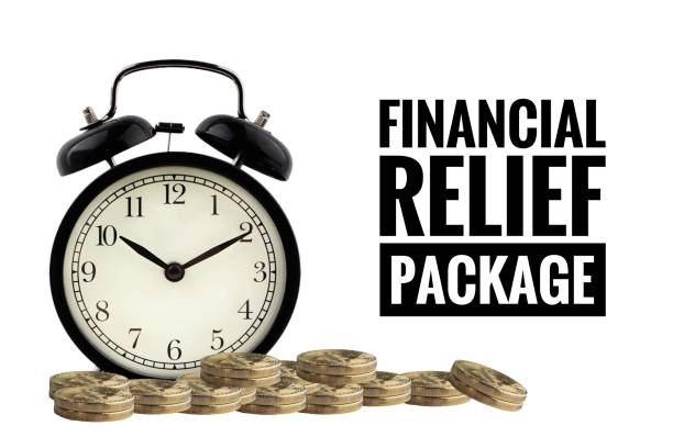 FINANCIAL RELIEF PACKAGE text  with alarm clock and coins on white background. FINANCIAL RELIEF PACKAGE text  with alarm clock and coins on white background. Business and economic concept congressional country club stock pictures, royalty-free photos & images