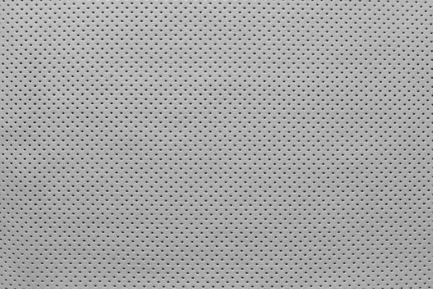texture leather of pale gray color with outer side texture of leather fabric with outer side for pure backgrounds of pale gray color with the punched openings pegboard stock pictures, royalty-free photos & images