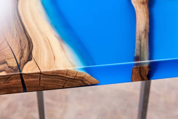 Texture of a wooden table with epoxy resin. stock photo