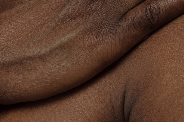 Texture of human skin. Close up of african-american male body Hand. Detailed texture of human skin. Close up shot of young african-american male body. Skincare, bodycare, healthcare, hygiene and medicine concept. Looks beauty and well-kept. Dermatology. human skin close up stock pictures, royalty-free photos & images