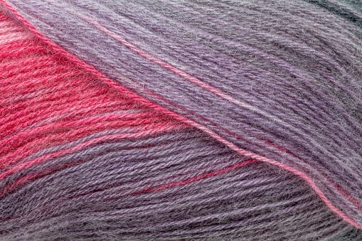 Knitting crochet cotton pink yarn thread hook craft creative closeup macro photo.