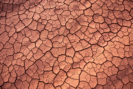 texture with dry and cracked soil on a farm in the city of Dourados, Mata Grosso do Sul, Brazil