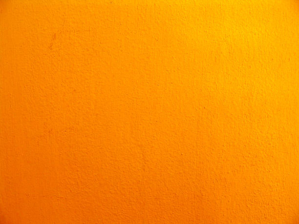 Textured multishaded orange wall stock photo