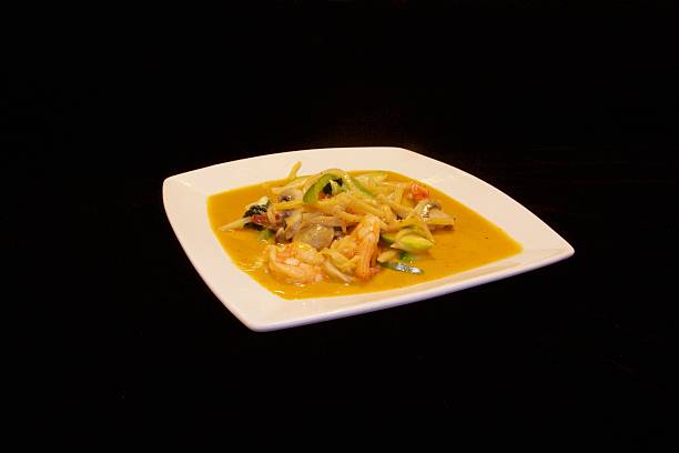 Thai Coconut Red Curry Sauce With Shrimp stock photo