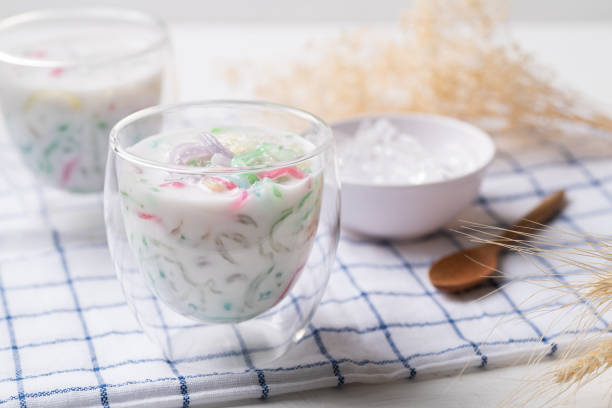 Thai dessert (Lod Chong), Colorful rice flour jelly (cendol) with coconut milk in glass Thai dessert (Lod Chong), Colorful rice flour jelly (cendol) with coconut milk in glass cendol stock pictures, royalty-free photos & images